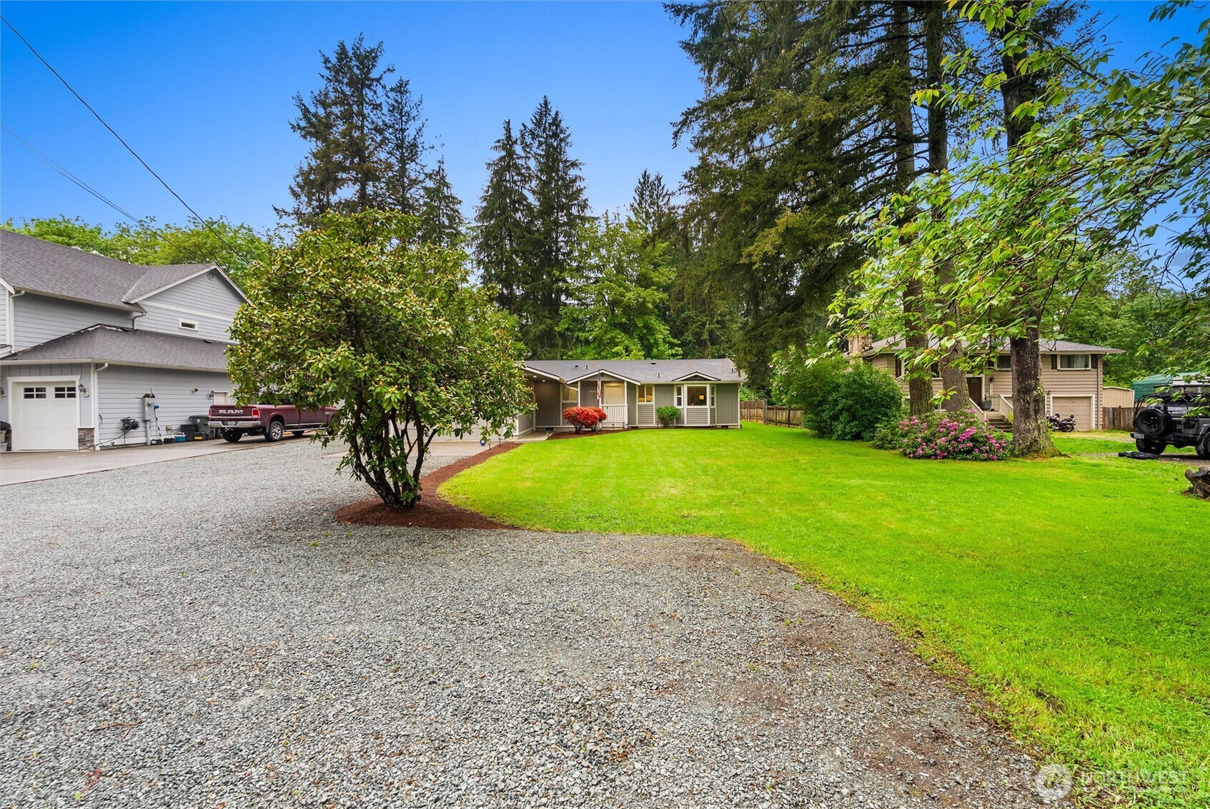 24711 Florence Acres Road Monroe, WA 98272 - Photo 5 of 33 a view of a house with a yard porch and sitting area
