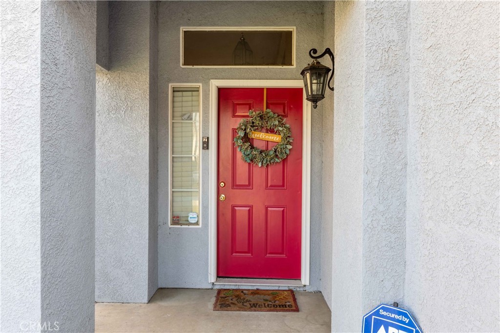 11541 Plane Tree Road Fontana, CA 92337 - Photo 3 of 33 a view of a red door of the house