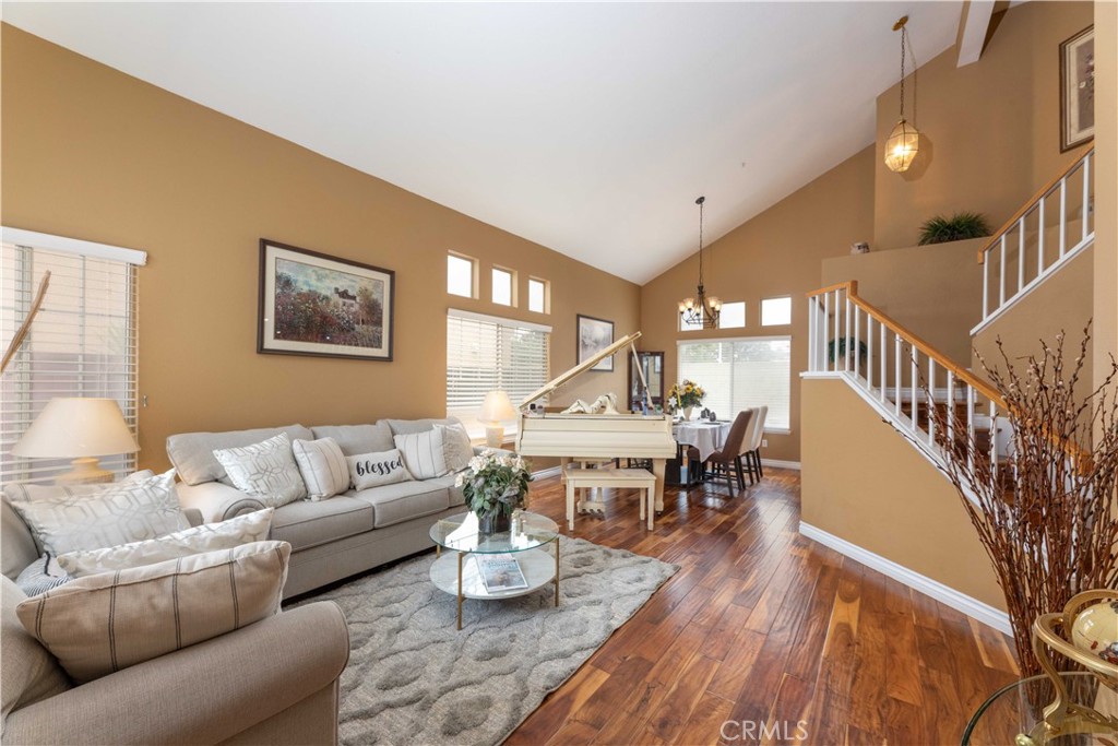 11541 Plane Tree Road Fontana, CA 92337 - Photo 5 of 33 a living room with furniture and a wooden floor