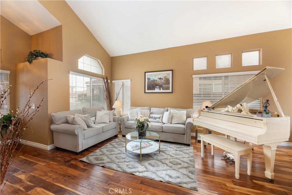 11541 Plane Tree Road Fontana, CA 92337 - Photo 6 of 33 a living room with furniture and a large window