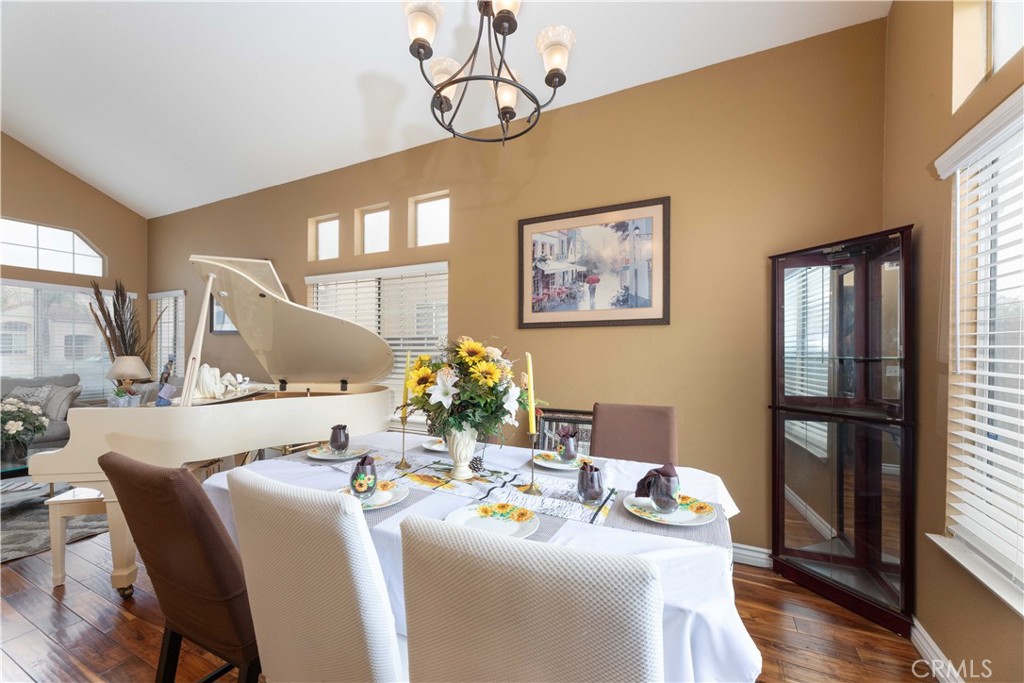 11541 Plane Tree Road Fontana, CA 92337 - Photo 8 of 33 a view of a dining room with furniture window and wooden floor