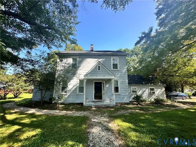 a front view of house with yard