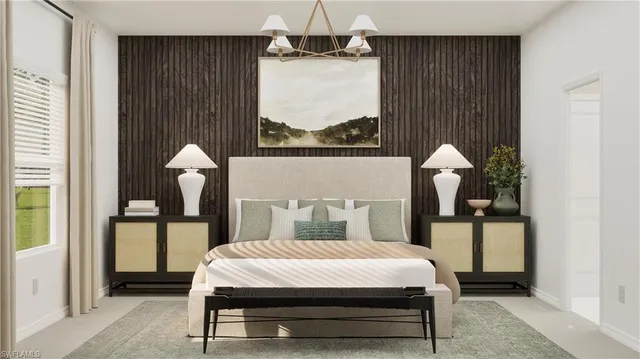 a bedroom with furniture and a window