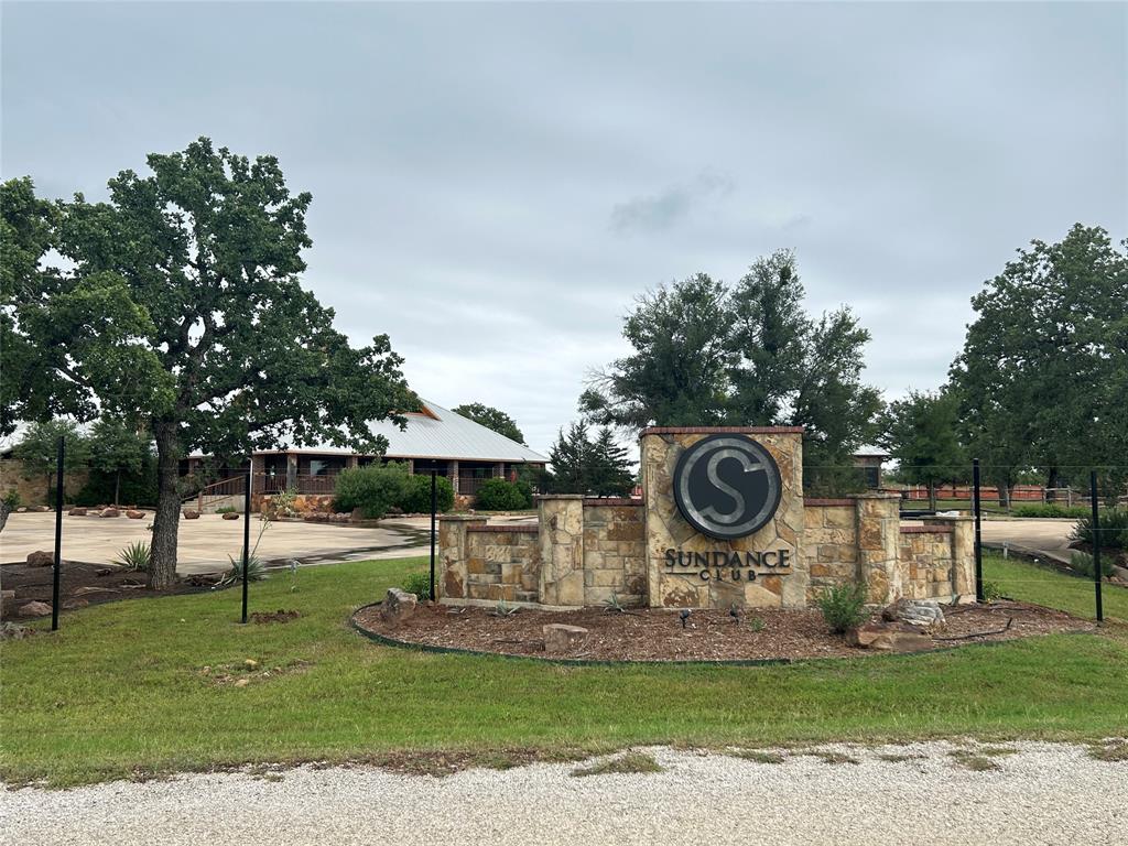 1190 Post Oak Road Gordon, TX 76453 - Photo 8 of 19 a view of a white house with a swimming pool and a yard