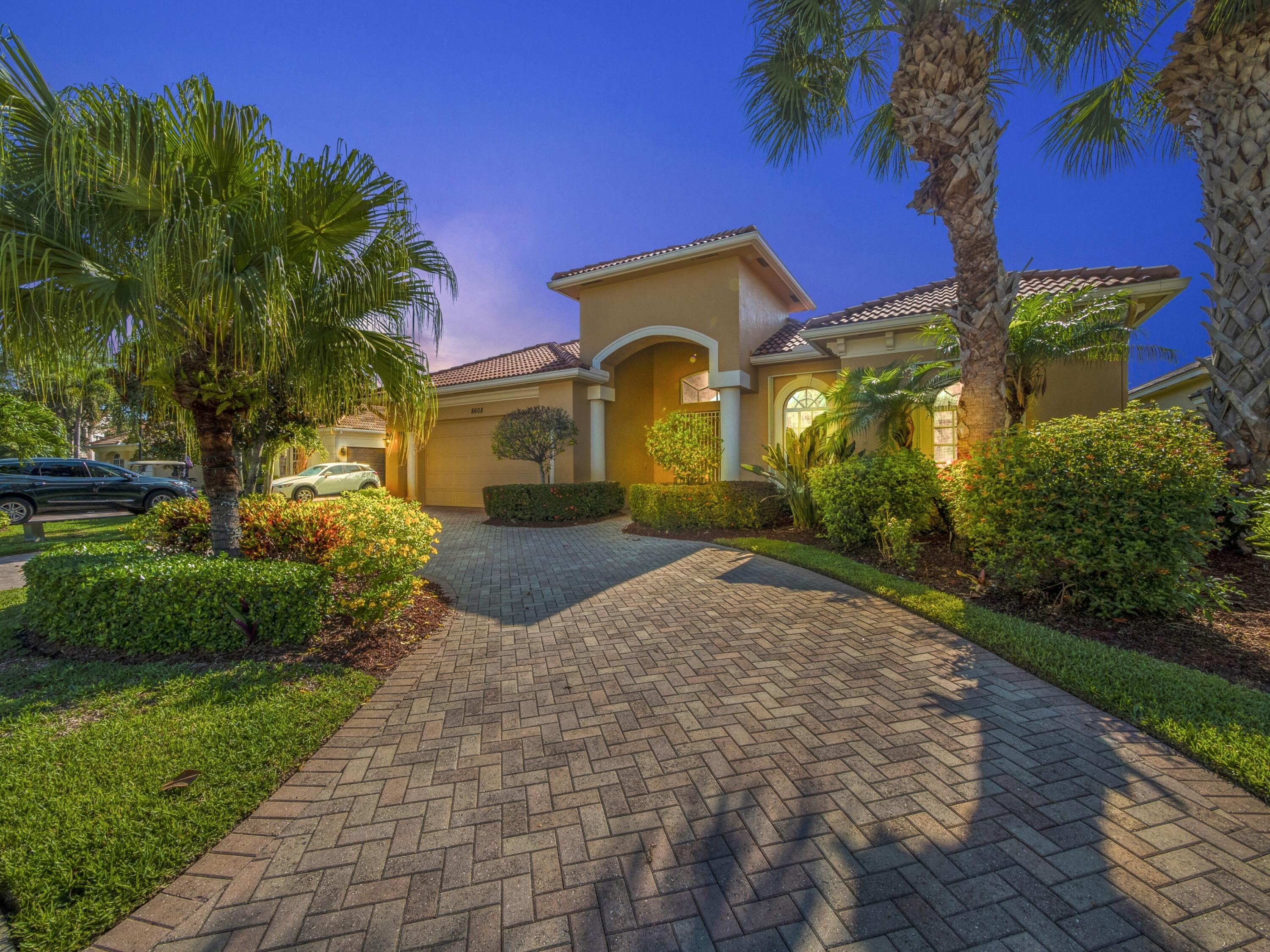 8608 Tompson Point Road Port St. Lucie, FL 34986 - Photo 1 of 50 Exterior Front Night Shot