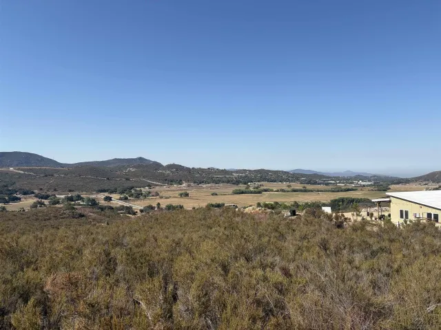 a view of lake with mountain