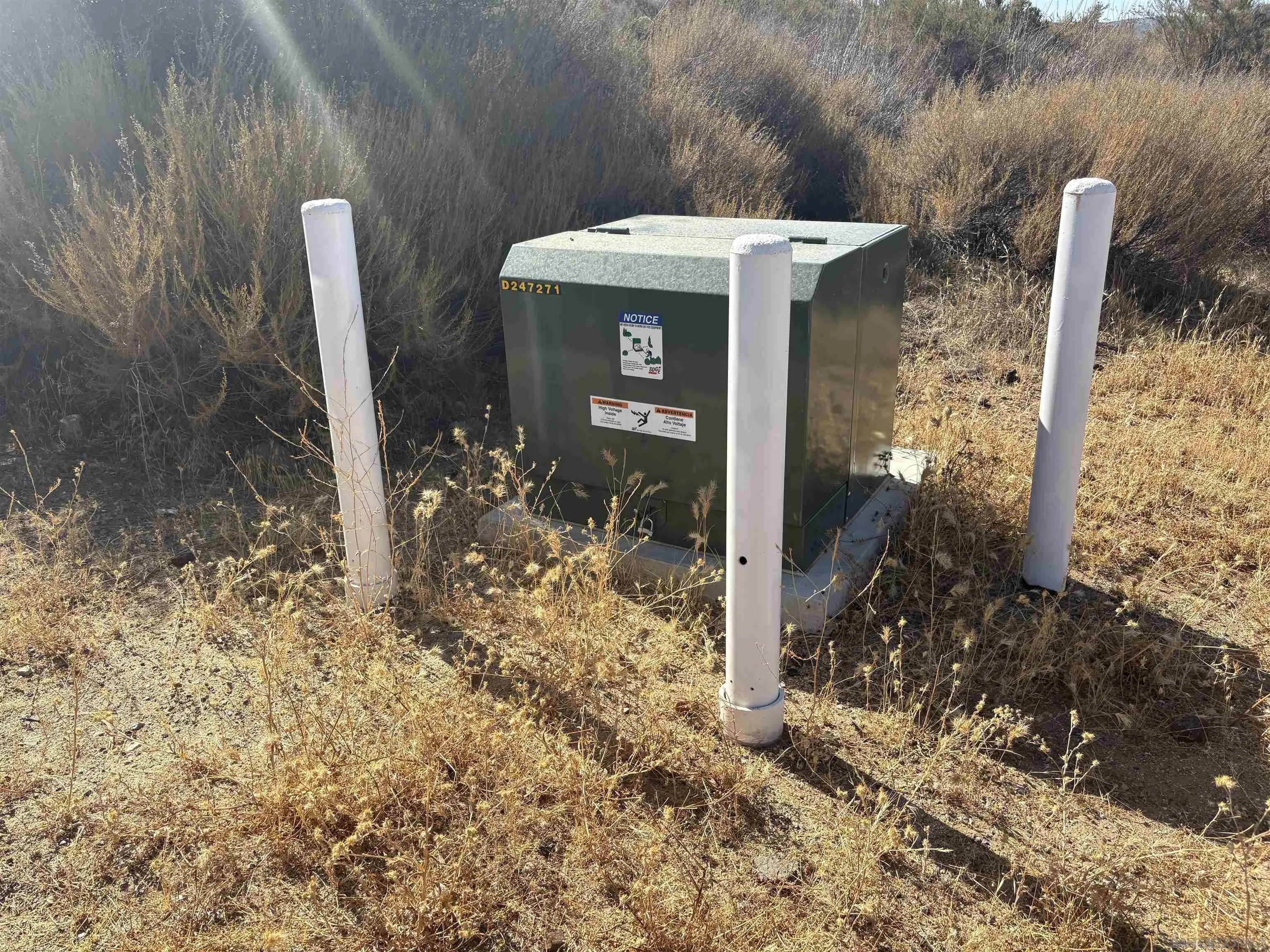 0 Viejas Grade Road, Unit 12 Alpine, CA 91901 - Photo 8 of 9 a front view of a house with lots of green space and plants