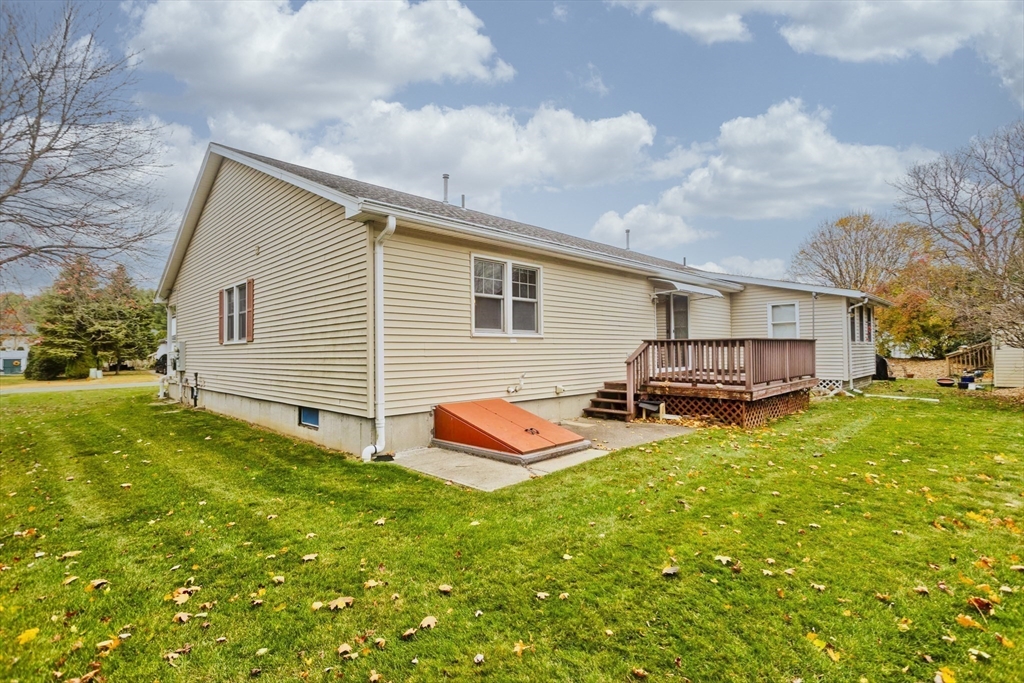 86 Beveridge Boulevard, Unit 86 Westfield, MA 01085 - Photo 15 of 16 a view of a house with pool and a yard