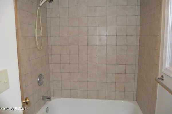 a bathroom with a bathtub