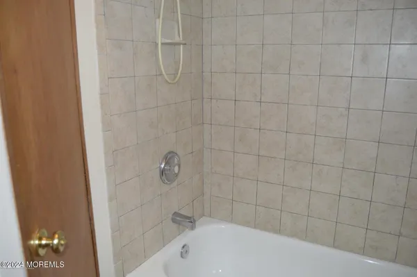 a bathroom with a bathtub