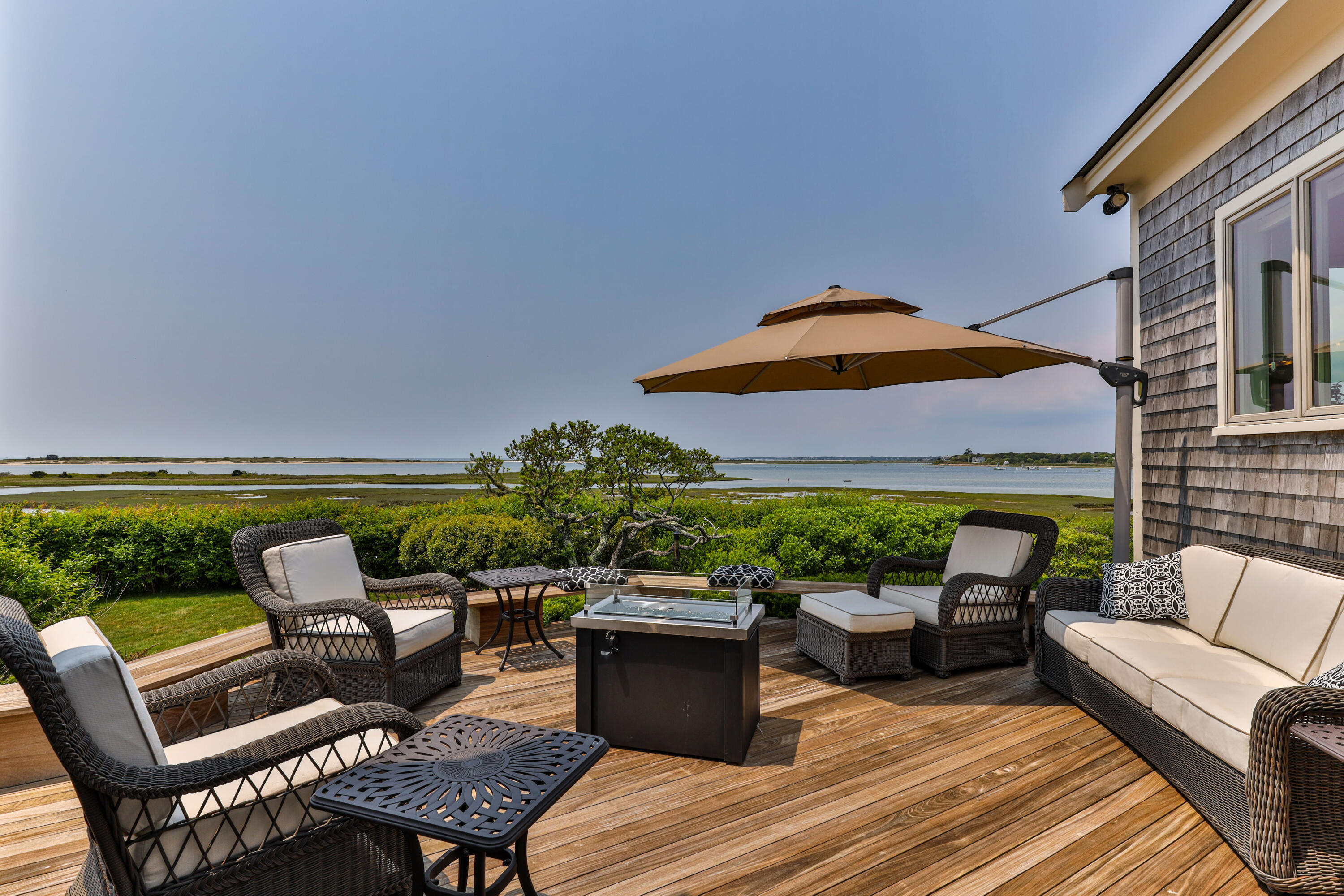 270 Stage Island Road Chatham, MA 02633 - Photo 53 of 63 an outdoor sitting area with furniture and garden view