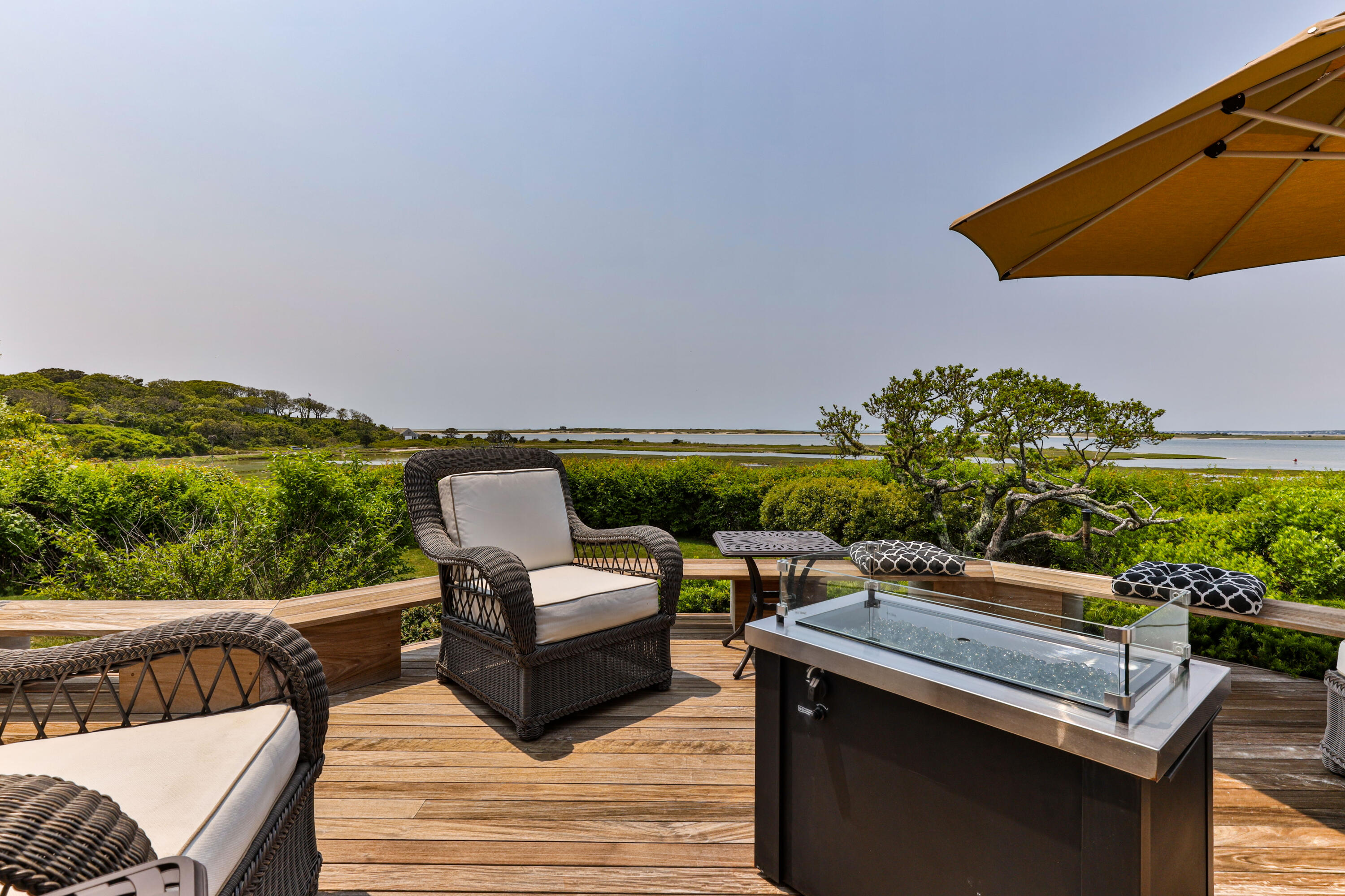 270 Stage Island Road Chatham, MA 02633 - Photo 54 of 63 a balcony with outdoor seating and plants