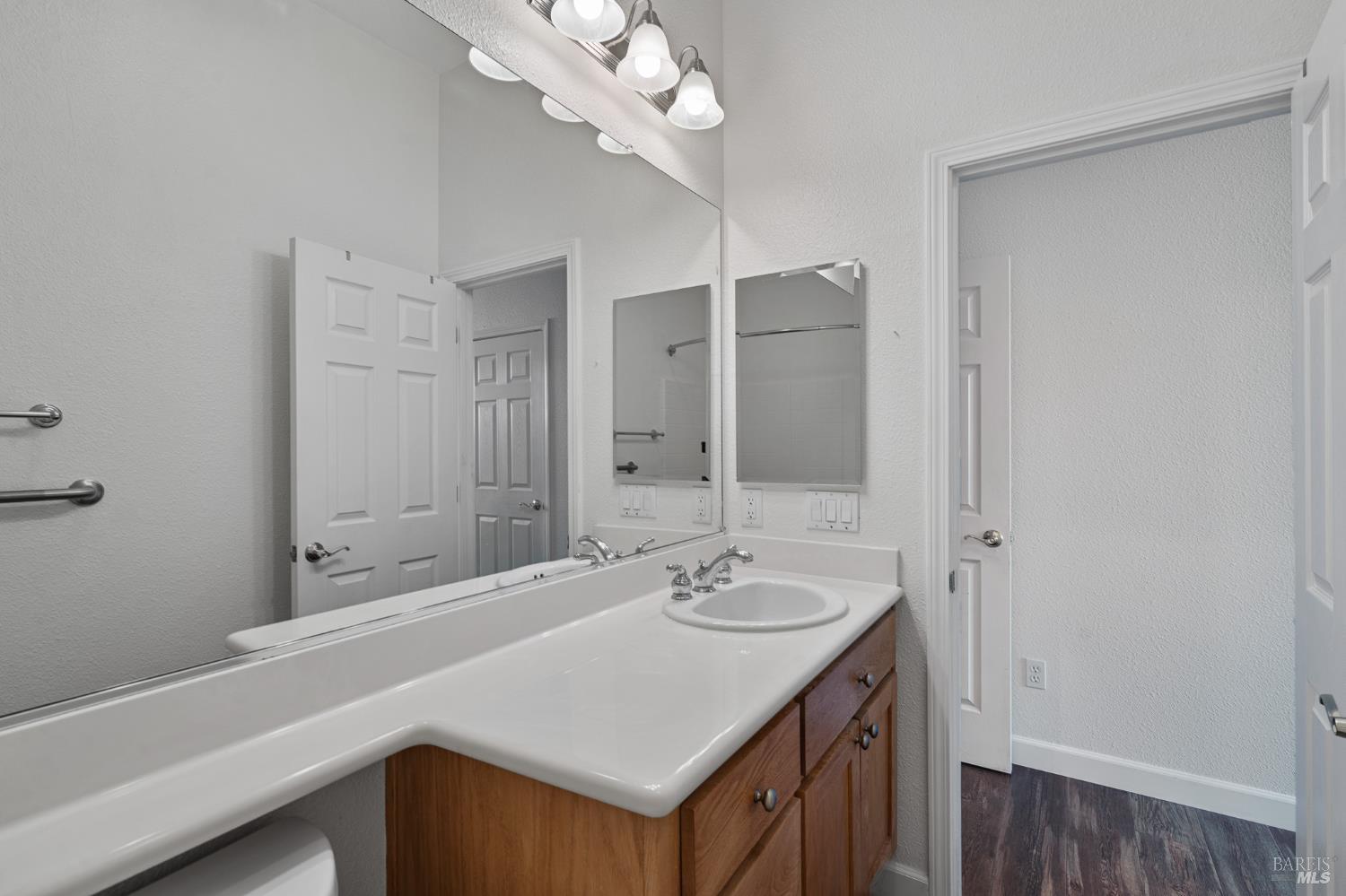 350 Canyon Spring Drive Rio Vista, CA 94571 - Photo 41 of 55 a bathroom with a sink a light fixture and a mirror