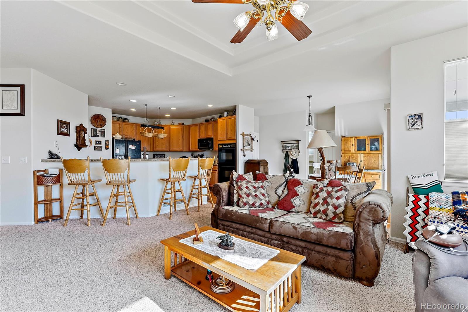 8006 Raspberry Drive Frederick, CO 80504 - Photo 5 of 27 a living room with furniture and white walls