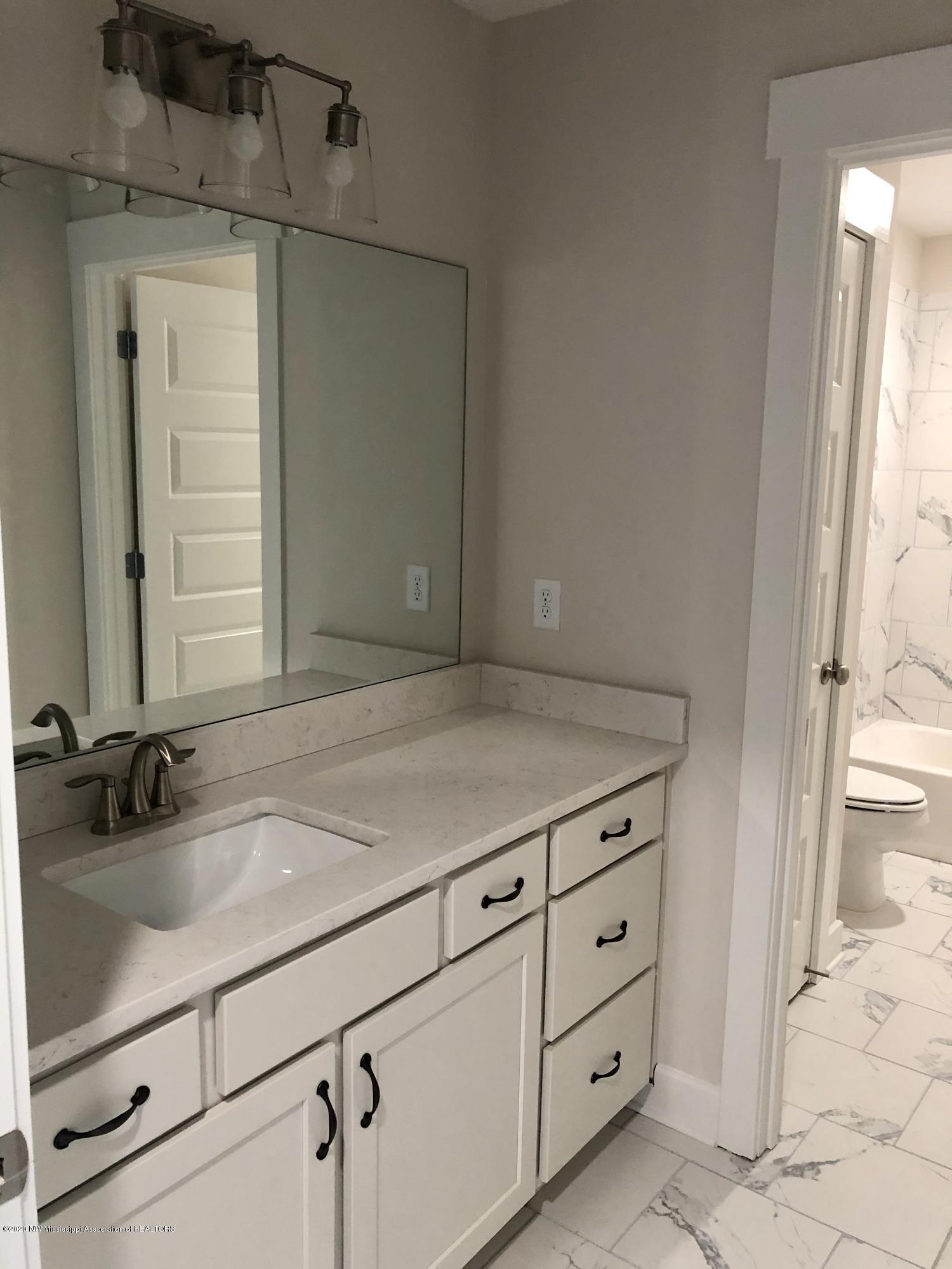 8824 Mitchell Grv Road North Olive Branch, MS 38654 - Photo 16 of 19 Upstairs Bath
