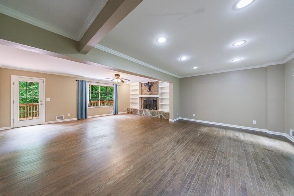 10565 Shallowford Road Roswell, GA 30075 - Photo 11 of 18 a view of a livingroom with wooden floor and window