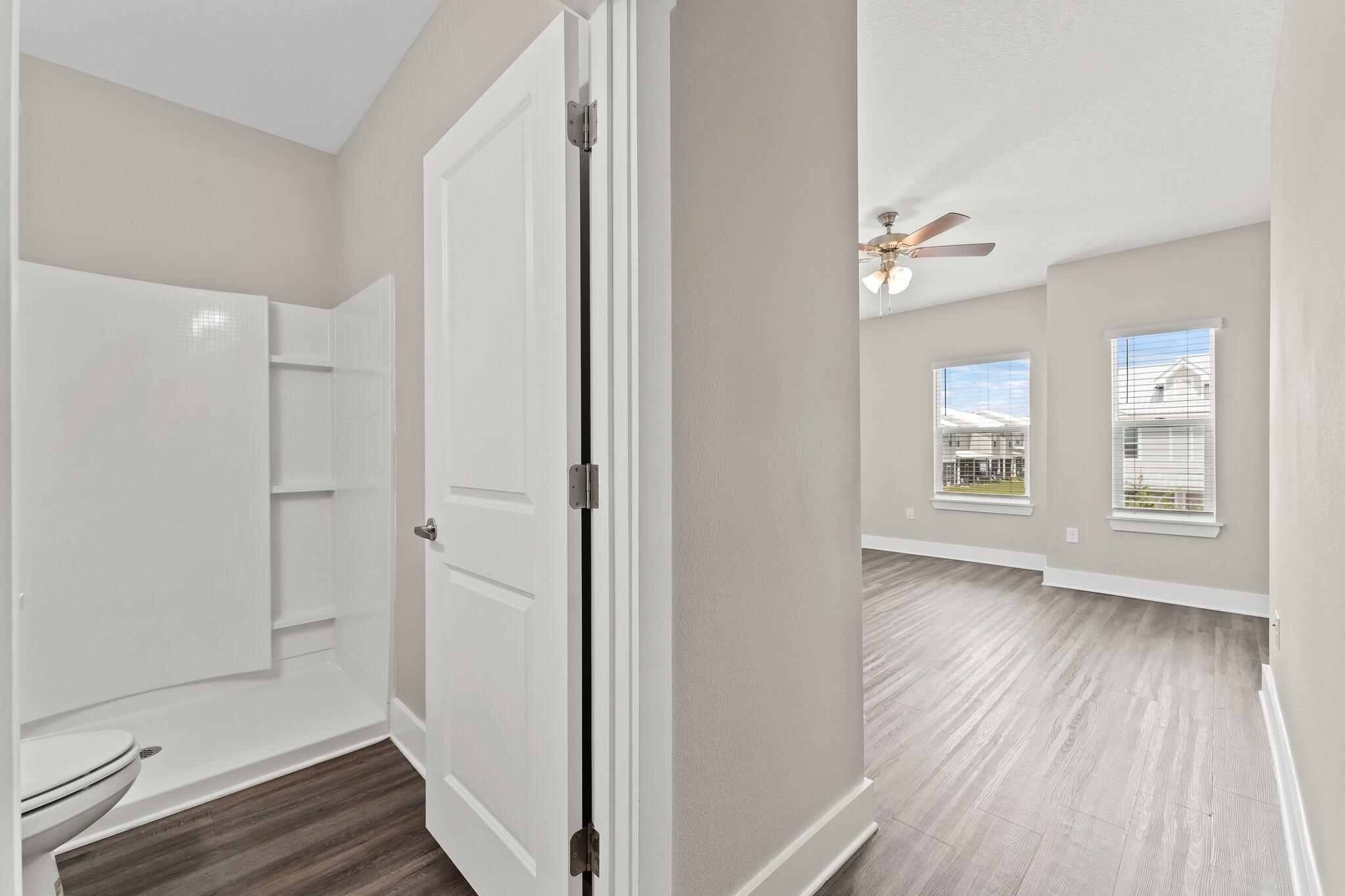 352 North Sand Palm Road, Unit VISTA Freeport, FL 32439 - Photo 13 of 29 a view of room with window and wooden floor