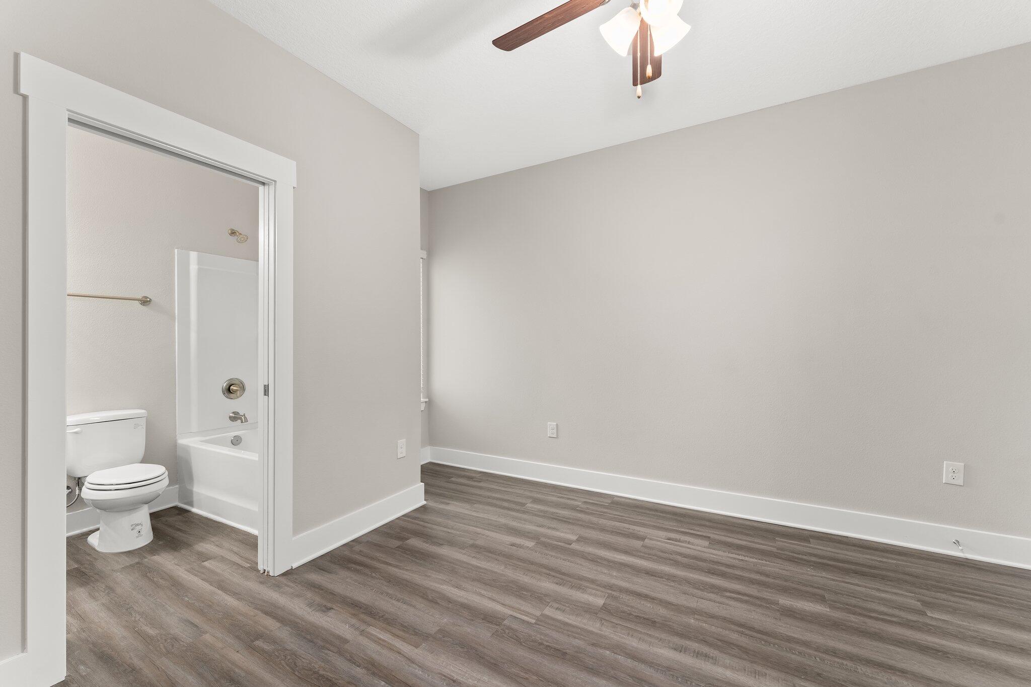 352 North Sand Palm Road, Unit VISTA Freeport, FL 32439 - Photo 20 of 29 a view of a bathroom with wooden floor