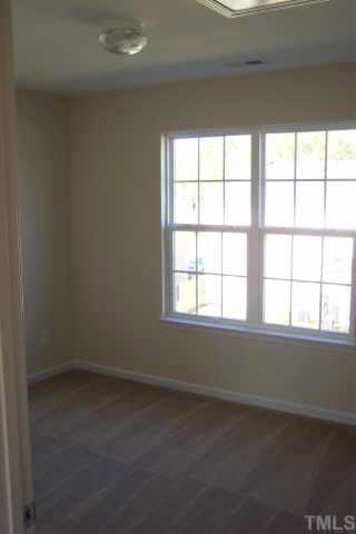 3539 Oneonta Avenue Raleigh, NC 27604 - Photo 9 of 10 an empty room with a window