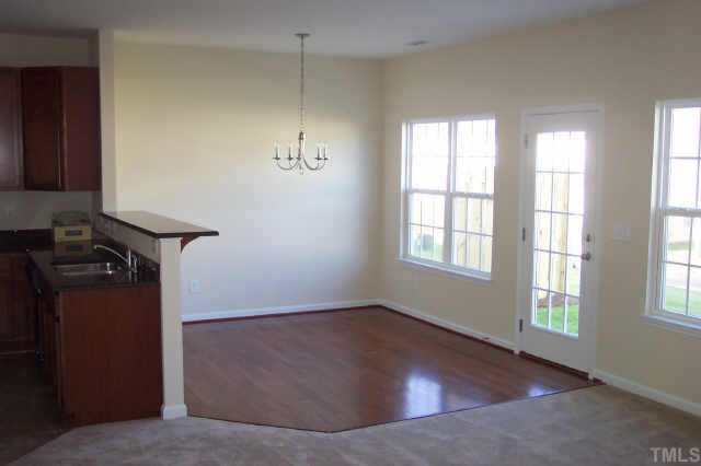 3539 Oneonta Avenue Raleigh, NC 27604 - Photo 10 of 10 an empty room with windows