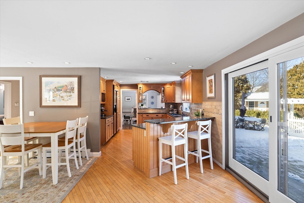 10 Spring Road Westborough, MA 01581 - Photo 11 of 42 a view of a dining room with furniture and wooden floor