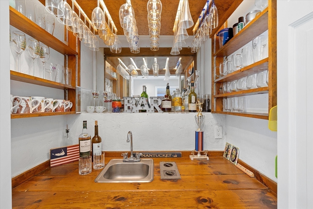 10 Spring Road Westborough, MA 01581 - Photo 15 of 42 a bathroom with a sink and a window