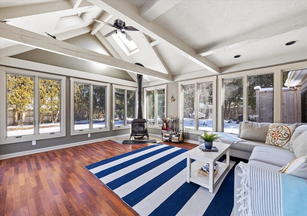 10 Spring Road Westborough, MA 01581 - Photo 16 of 42 a living room with furniture and large windows