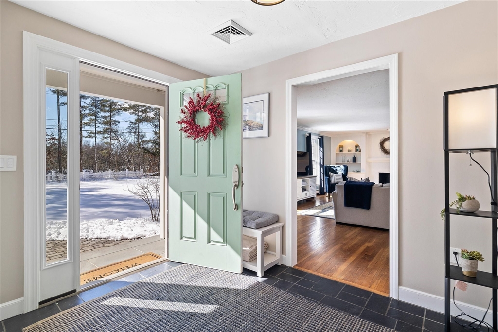 10 Spring Road Westborough, MA 01581 - Photo 2 of 42 a living room with furniture and a large window