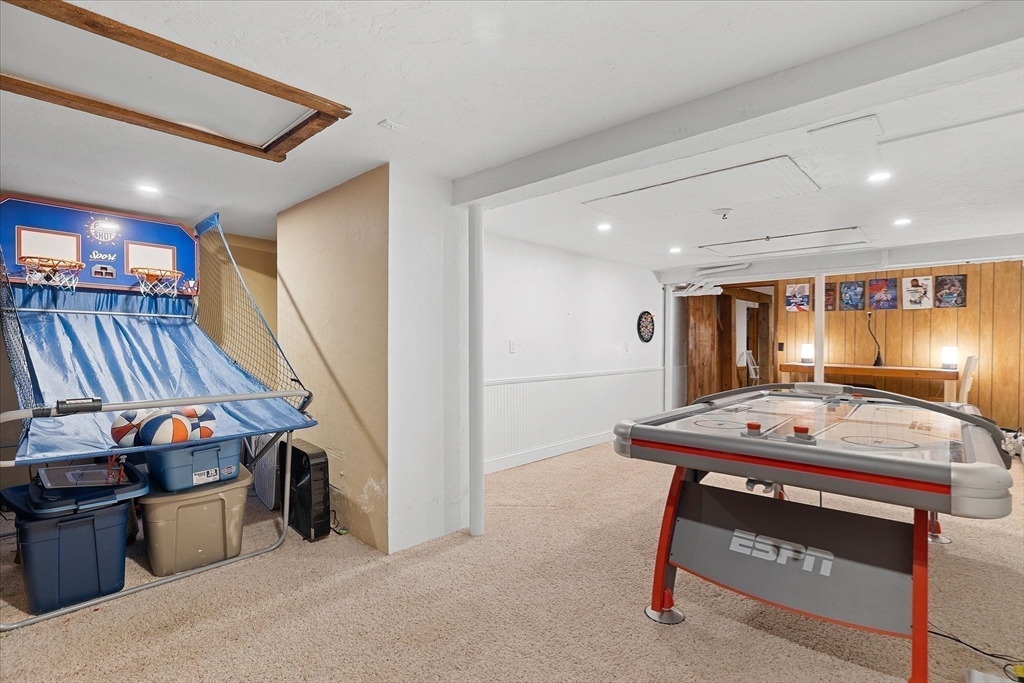 10 Spring Road Westborough, MA 01581 - Photo 32 of 42 a room with furniture and air hockey table
