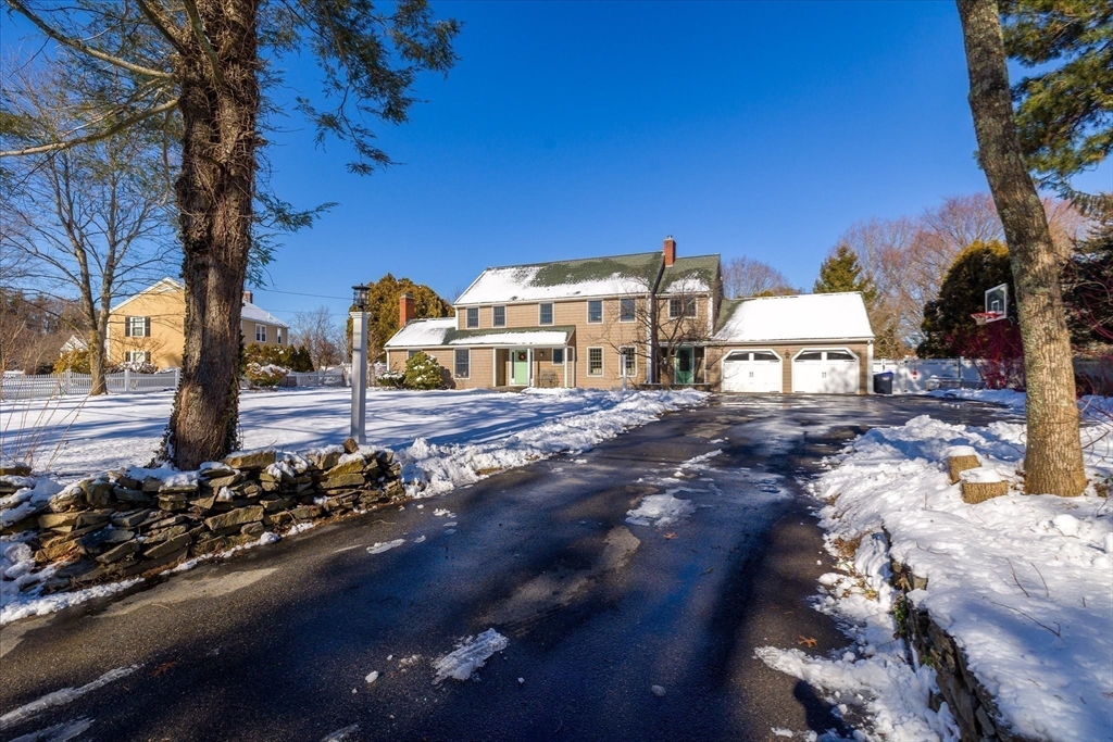 10 Spring Road Westborough, MA 01581 - Photo 38 of 42 a view of a house with a yard