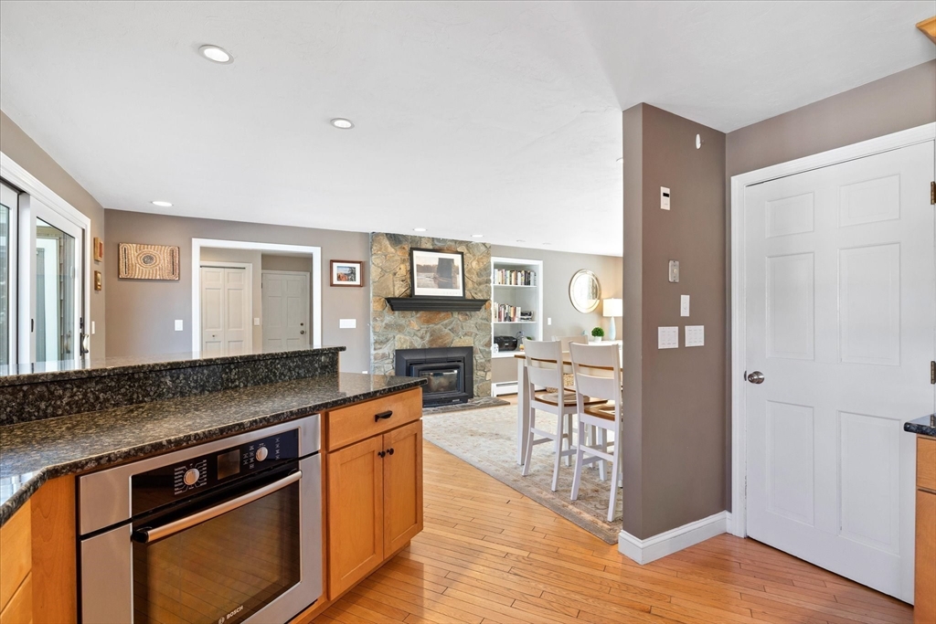 10 Spring Road Westborough, MA 01581 - Photo 10 of 42 a kitchen with stainless steel appliances granite countertop a stove and cabinets
