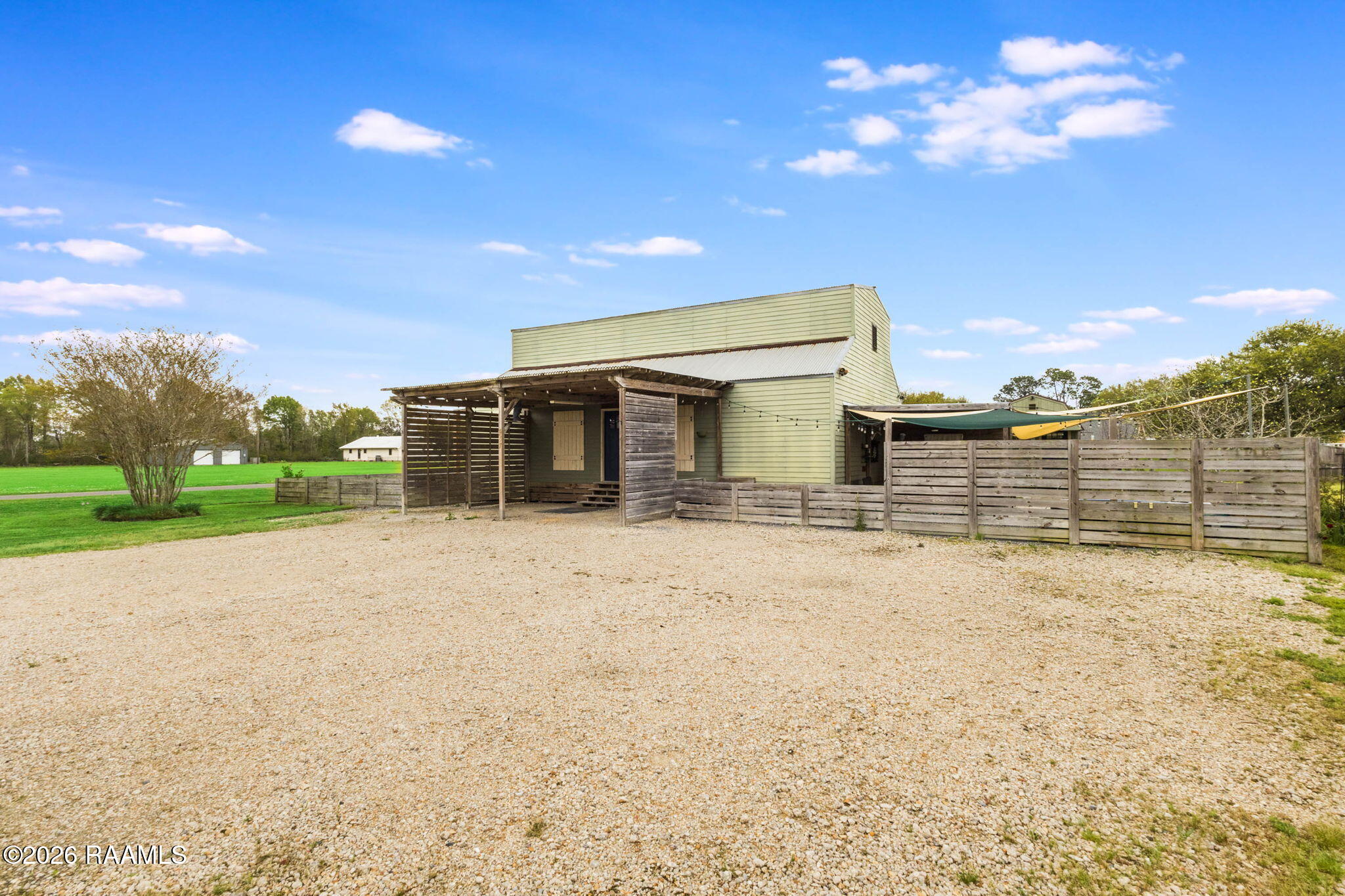 4527 Naud Road Abbeville, LA 70510 - Photo 14 of 19 Driveway + Carport
