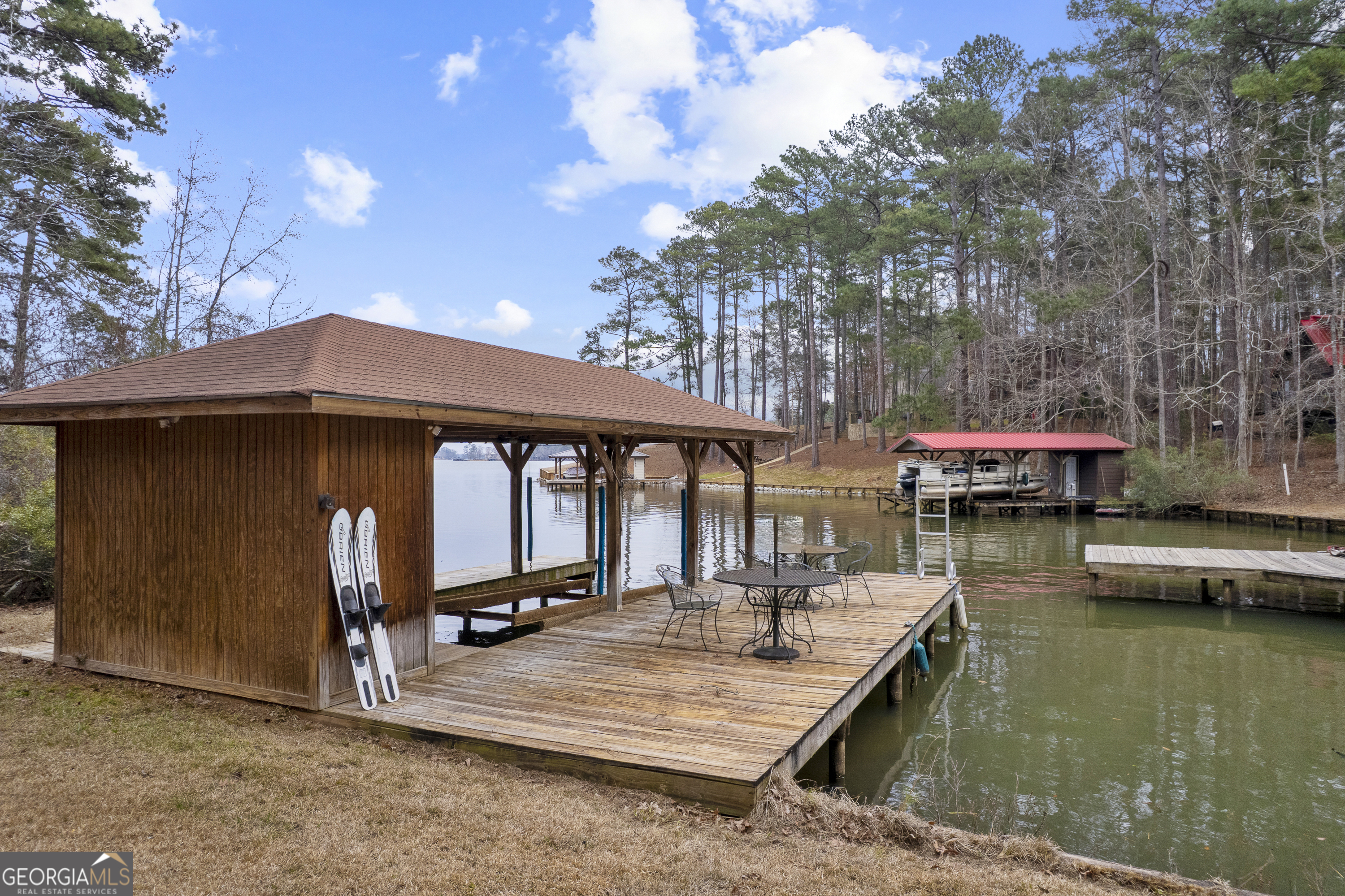 1011 Sandy Run Drive Sparta, GA 31087 - Photo 28 of 39 a view of a lake with a table and chairs