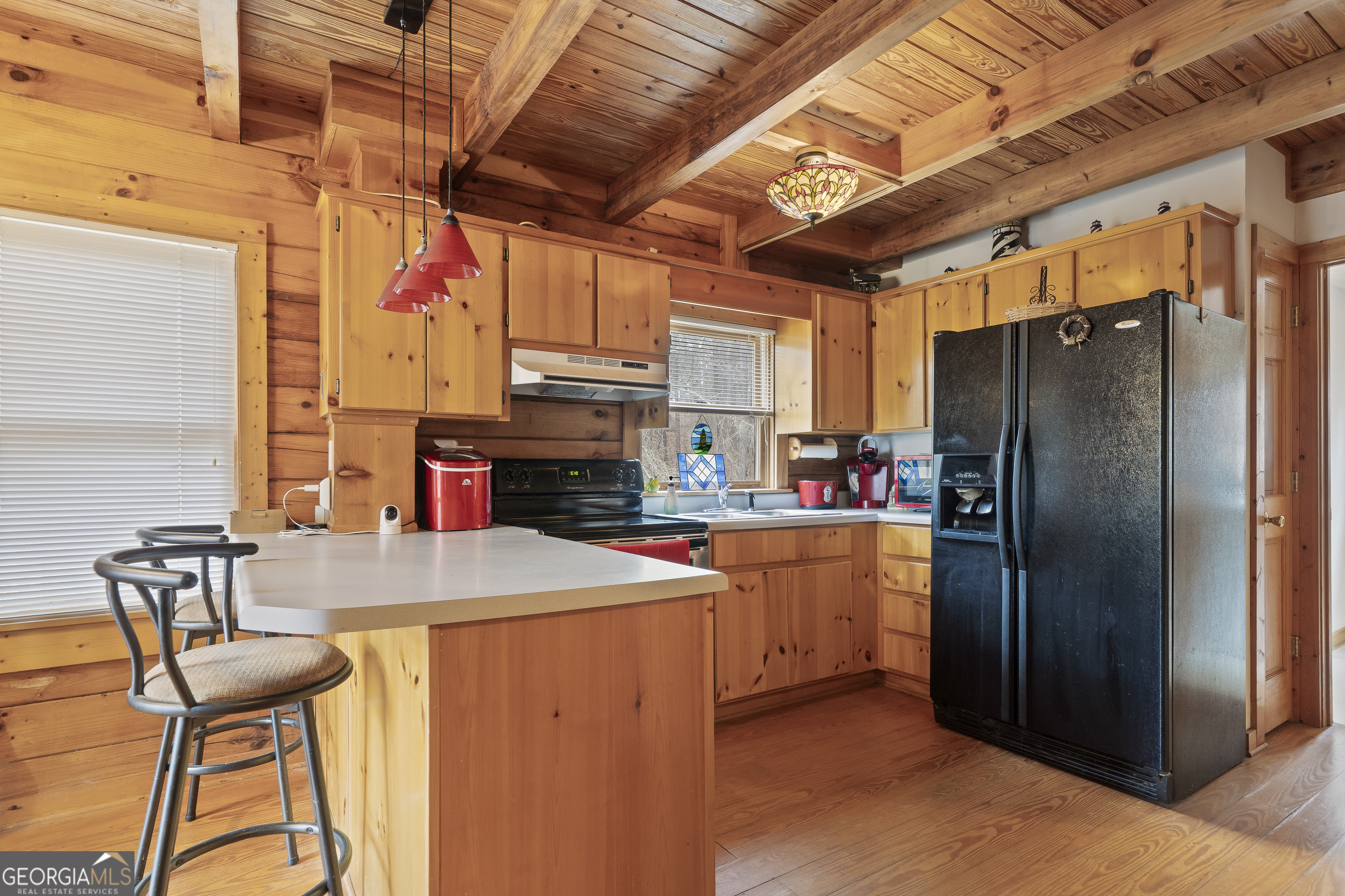 1011 Sandy Run Drive Sparta, GA 31087 - Photo 10 of 39 a kitchen with stainless steel appliances granite countertop a refrigerator and a stove top oven