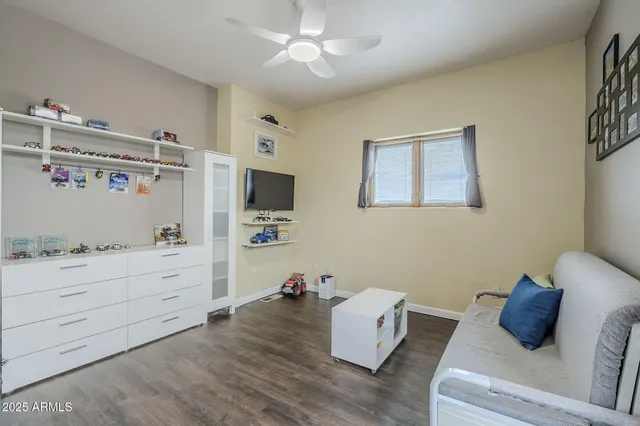 a living room with furniture and decor