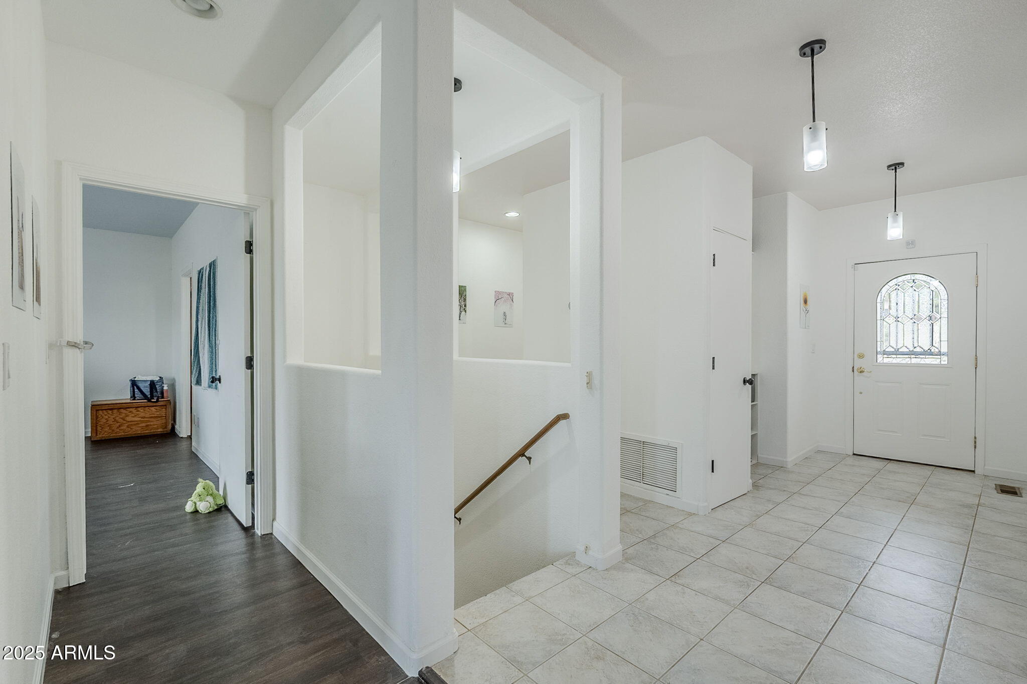 17862 East Hummingbird Lane Mayer, AZ 86333 - Photo 19 of 46 a view of a hallway with wooden floor and furniture