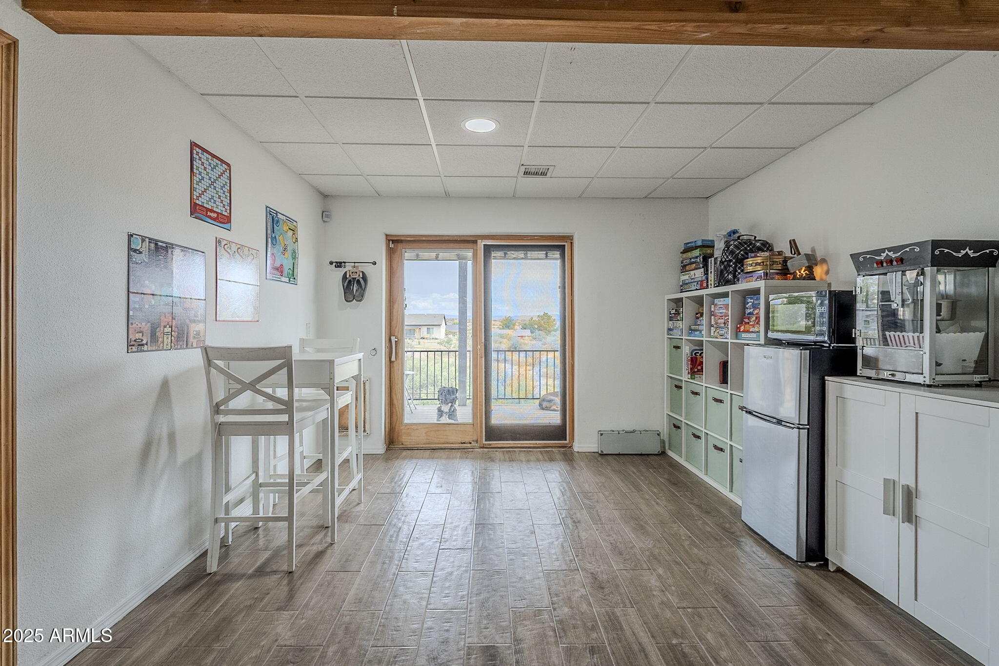 17862 East Hummingbird Lane Mayer, AZ 86333 - Photo 21 of 46 a view of a workspace with furniture and wooden floor