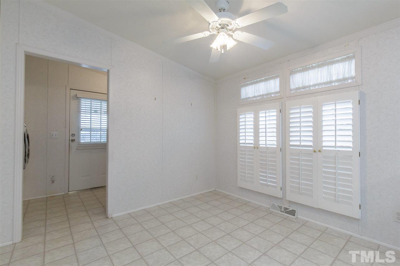 4959 Thom Road Mebane, NC 27302 - Photo 11 of 30 Plantation shutters and transoms in breakfast area