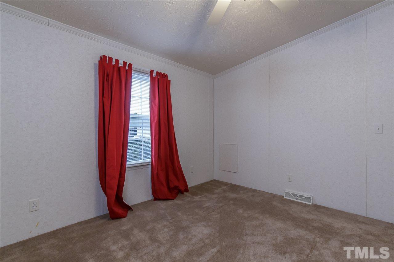 4959 Thom Road Mebane, NC 27302 - Photo 21 of 30 Bedroom 3 measures 11.9' x 10.2'