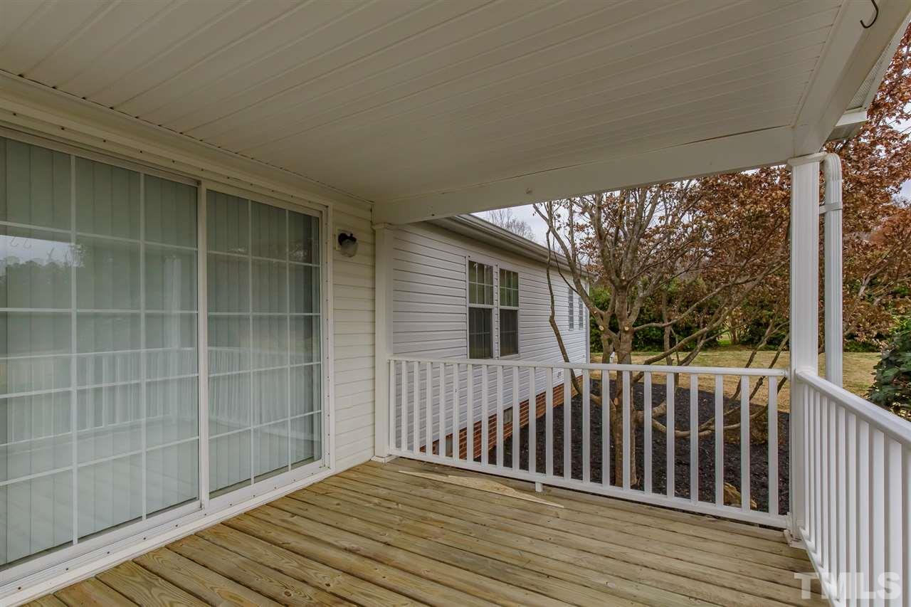 4959 Thom Road Mebane, NC 27302 - Photo 23 of 30 Access to family room from this 9.10' x 9.5' porch