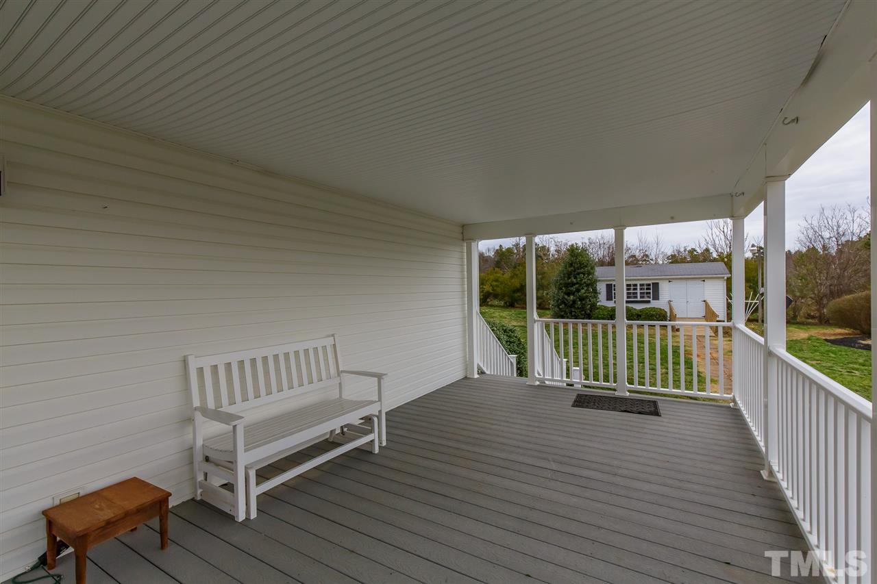 4959 Thom Road Mebane, NC 27302 - Photo 26 of 30 Covered side porch measures 23.6' x 11.2'