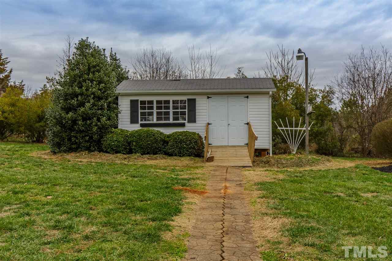 4959 Thom Road Mebane, NC 27302 - Photo 27 of 30 Storage building has ramp, double door and triple window