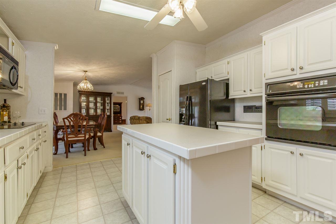 4959 Thom Road Mebane, NC 27302 - Photo 9 of 30 Stainless oven, dishwasher and refrigerator