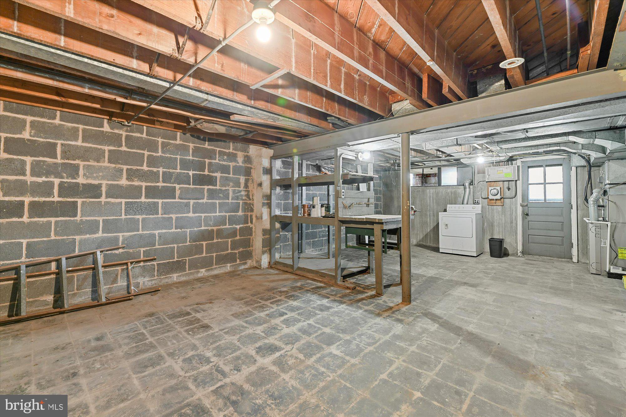 5912 Glennor Road Baltimore, MD 21239 - Photo 22 of 27 Unfinished basement with 1/2 bath
