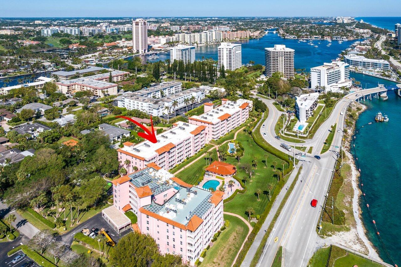 1040 Banyan Road, Unit 501C Boca Raton, FL 33432 - Photo 12 of 47 an aerial view of multiple houses with yard