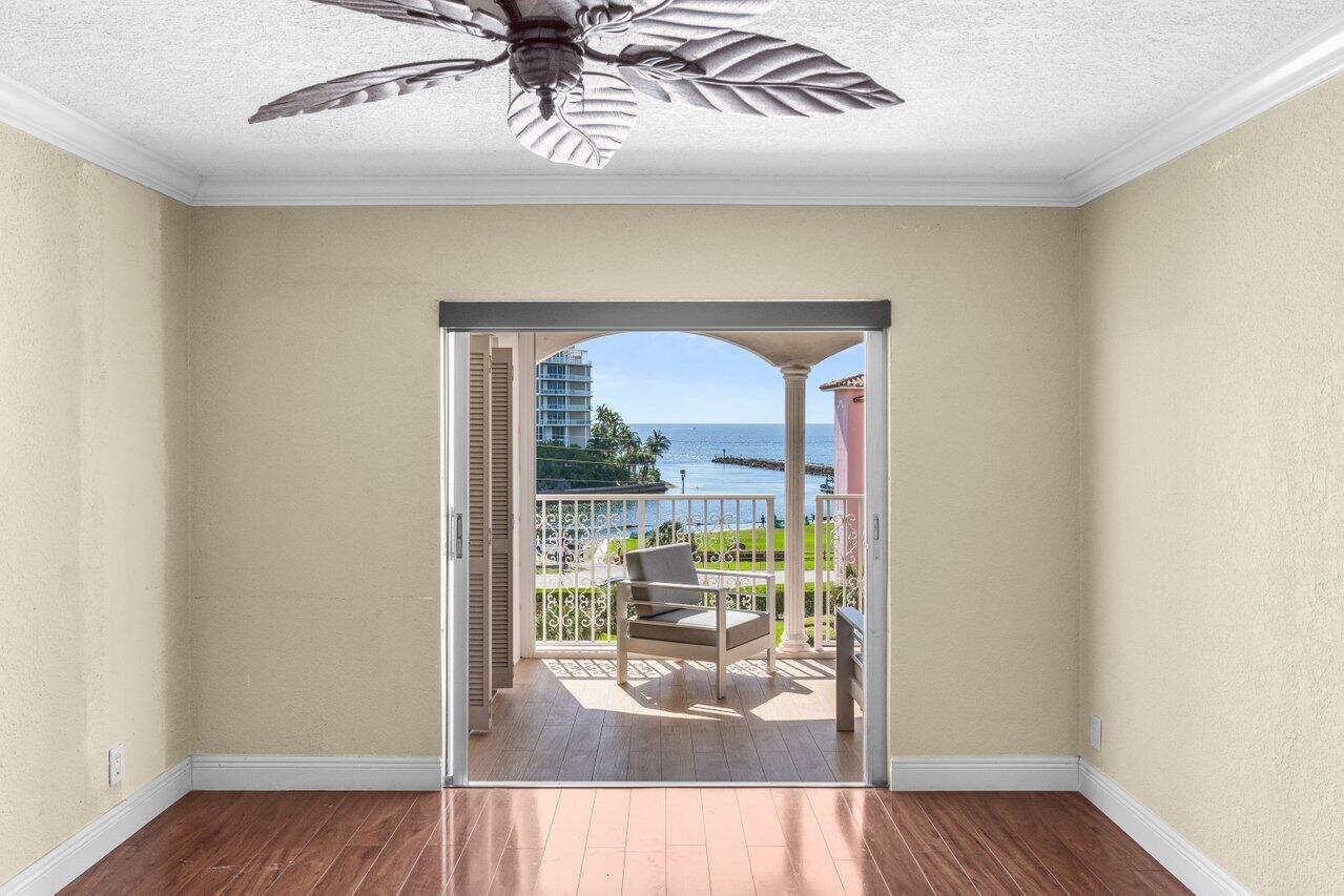1040 Banyan Road, Unit 501C Boca Raton, FL 33432 - Photo 21 of 47 wooden floor in an empty room with a window