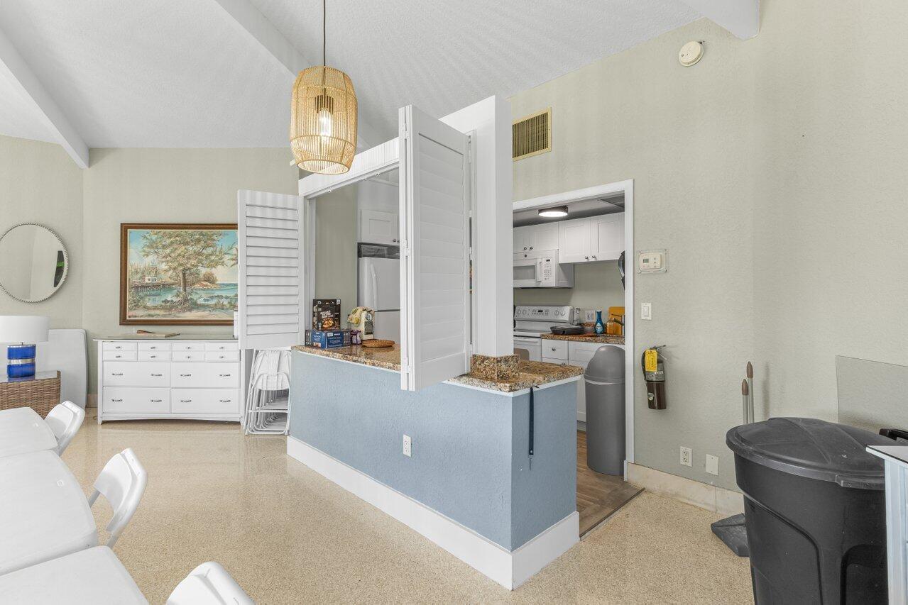 1040 Banyan Road, Unit 501C Boca Raton, FL 33432 - Photo 43 of 47 a living room with furniture and a window