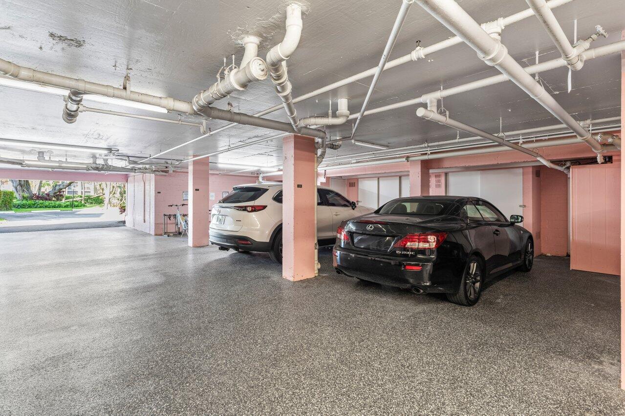 1040 Banyan Road, Unit 501C Boca Raton, FL 33432 - Photo 46 of 47 a view of parking garage with cars