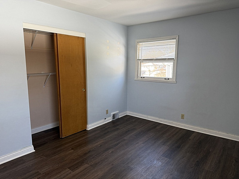 620 South 9th Avenue St. Charles, IL 60174 - Photo 15 of 30 a view of an empty room with wooden floor and a window