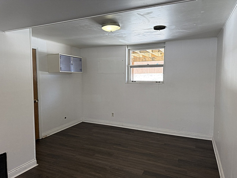 620 South 9th Avenue St. Charles, IL 60174 - Photo 22 of 30 an empty room with wooden floor and windows